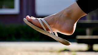 Feet 060 - Girls Soles Exposed While Wearing Flip Flops